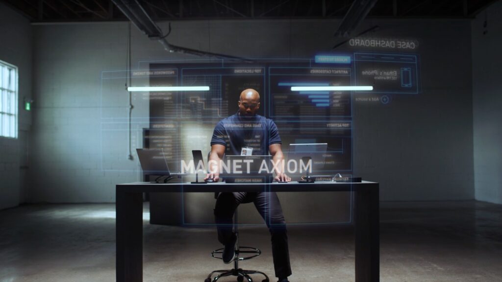 The Axiom establishing shot: an investigator at a desk surrounded by glowing case dashboard graphics
